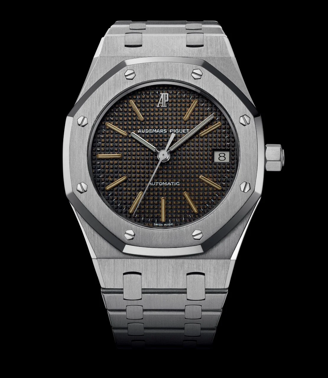 Steel 4332 No. 148, given to a UBS Switzerland crew member after the 1985–86 Whitbread race: dark T21 Tapisserie dial, luminous markers, centre seconds (engraving is on the caseback, not visible here). · Photo: Audemars Piguet · Licence pending · Source: https://apchronicles.audemarspiguet.com/en/model/4332--first-royal-oak-36mm
