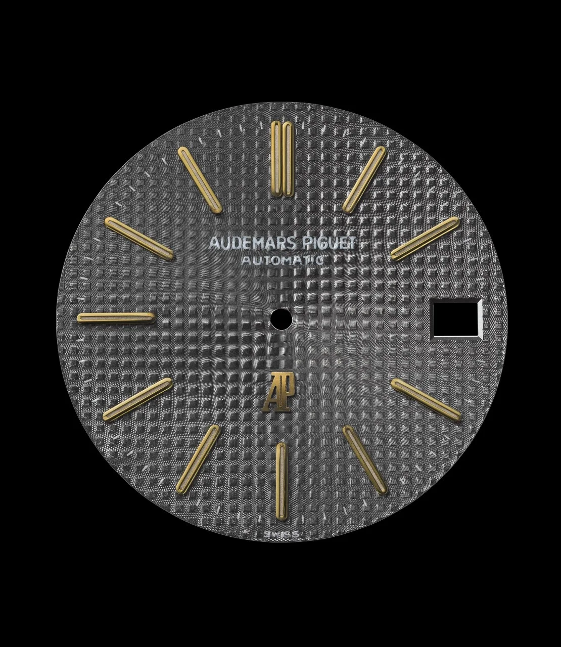 Loose slate-grey Tapisserie dial for the 5402SA with applied yellow-gold markers and AP monogram at 6. · Photo: Audemars Piguet · Licence pending · Source: https://apchronicles.audemarspiguet.com/en/article/model-5402-dial-variants